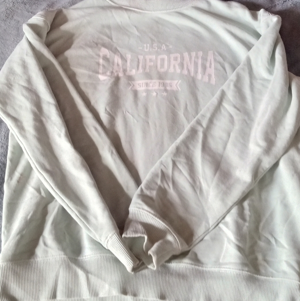 It is a forever 21 sweatshirt a size Medium